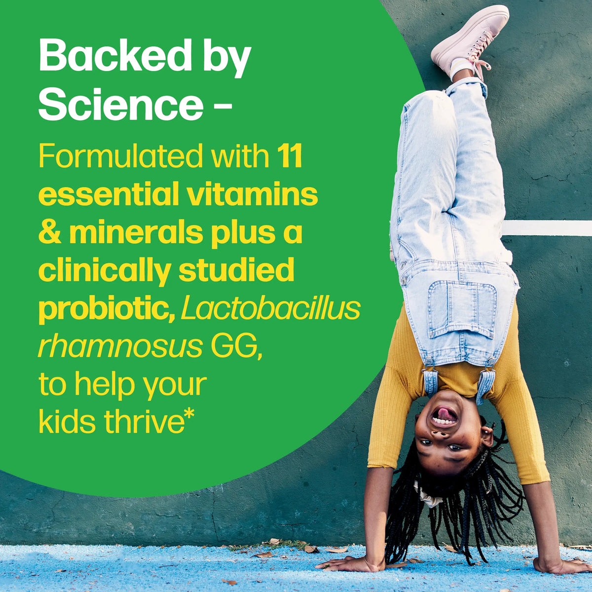 Child doing a handstand with a green supplement advertisement overlay.