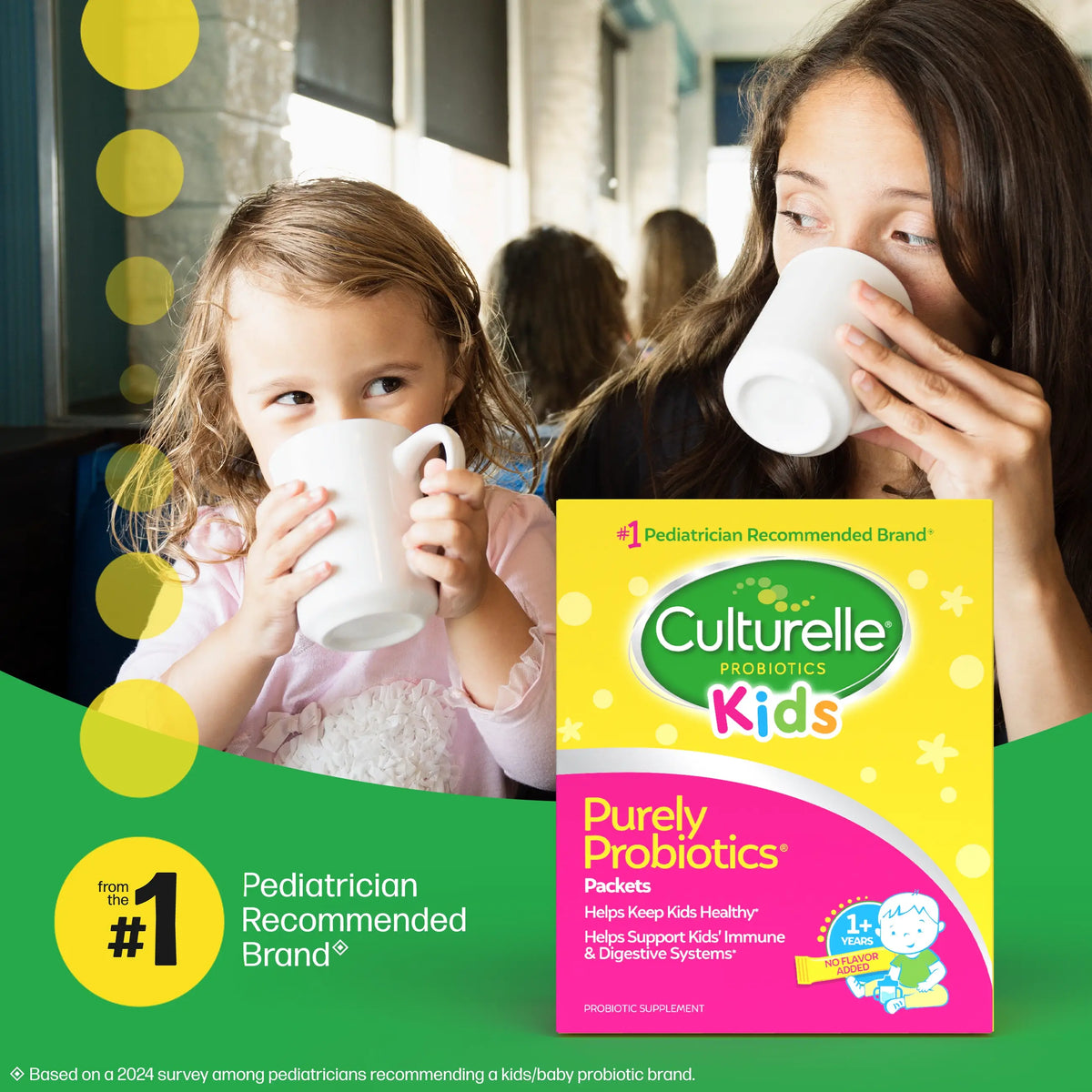 Two children and a woman drinking from mugs with a Culturelle Kids probiotics package in the foreground.