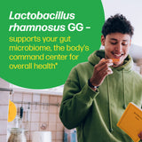 Person eating a snack with text about Lactobacillus rhamnosus GG in a kitchen setting