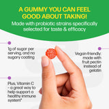 Gummy being held between fingers with promotional text about its benefits on a green and white background