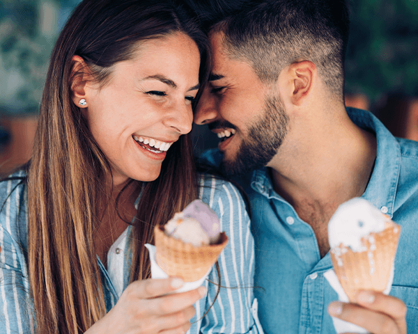 woman and man eating ice cream