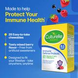 Culturelle immune defense probiotic packaging with mixed berry flavor on a blue background