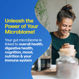 Woman smiling with text about the power of the microbiome on a blue background