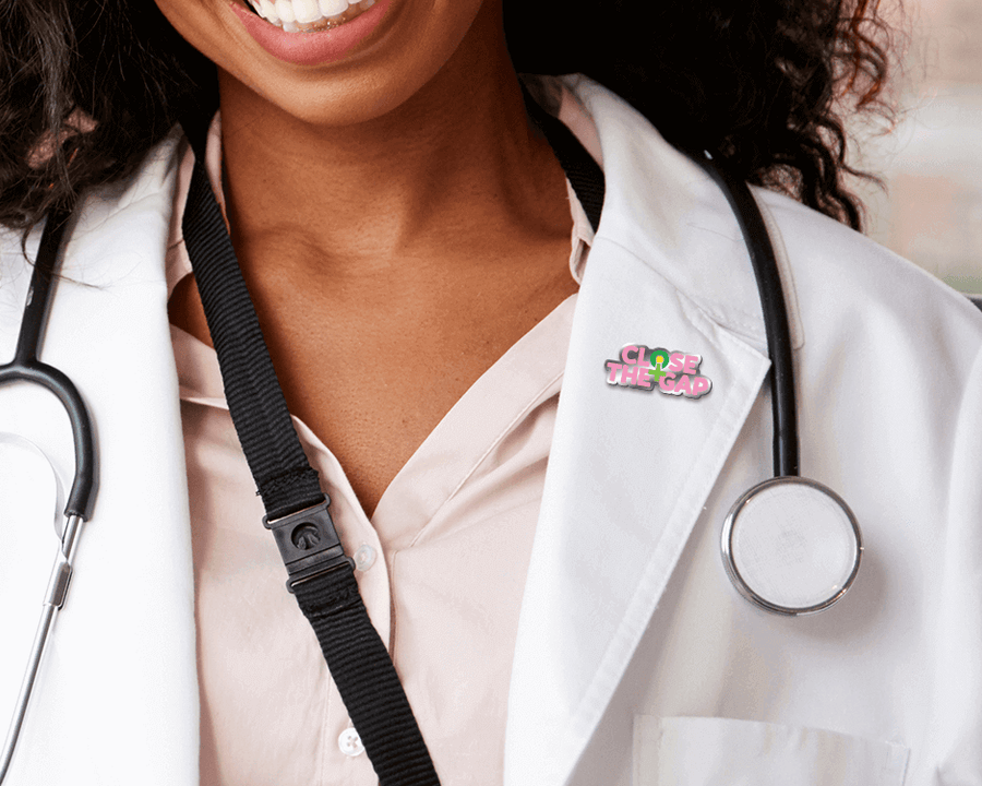 woman doctor wearing close the gap pin